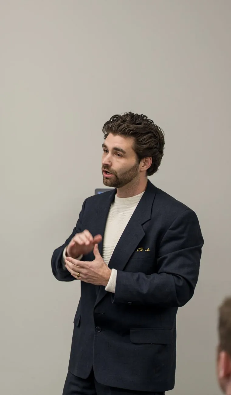 Dillon speaking to a room